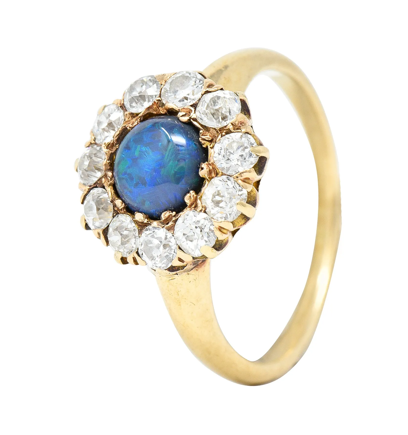 Victorian 0.88 CTW Black Opal Cabochon Old European Cut Diamond 14 Karat Yellow Gold Antique Halo Ring