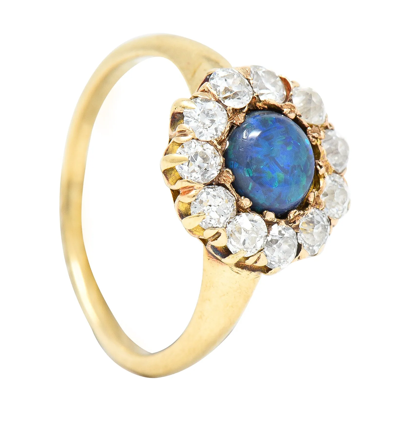 Victorian 0.88 CTW Black Opal Cabochon Old European Cut Diamond 14 Karat Yellow Gold Antique Halo Ring